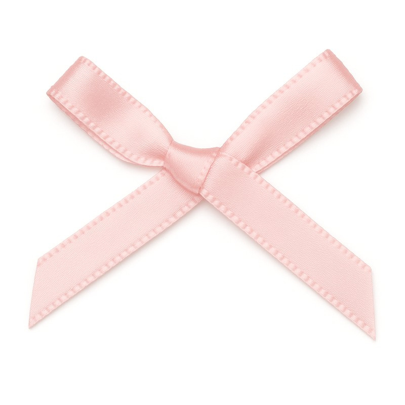 Petit nœud satiné rose clair pour décorer vos faire-part naissance ou à coller sur votre décoration de baptême